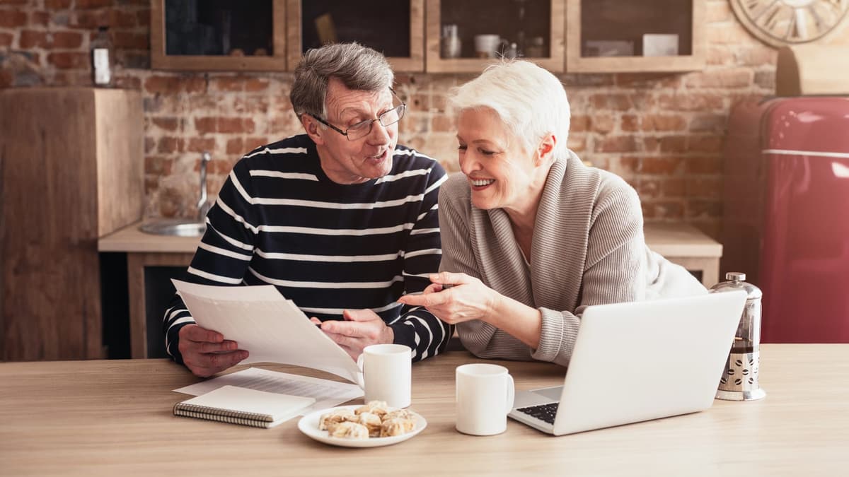 A family reviewing documents together at home